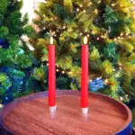 Battery operated LED Christmas candles in red colour made from real wax