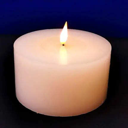 Battery operated Christmas wax candle in white colour for tabletop decor
