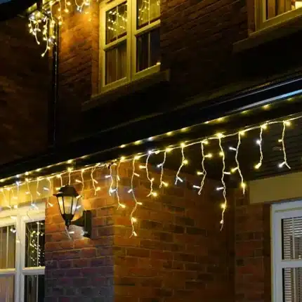 Warm white with ice white flash LED icicle Christmas lights for indoor and outdoor use